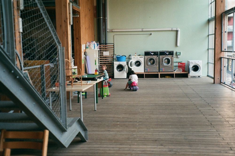 holon - a space transformed into a communal laundry.