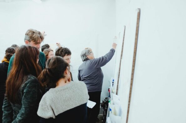 holon - people at a whiteboard